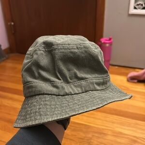 Green bucket hat, lightly worn, from a beach store!